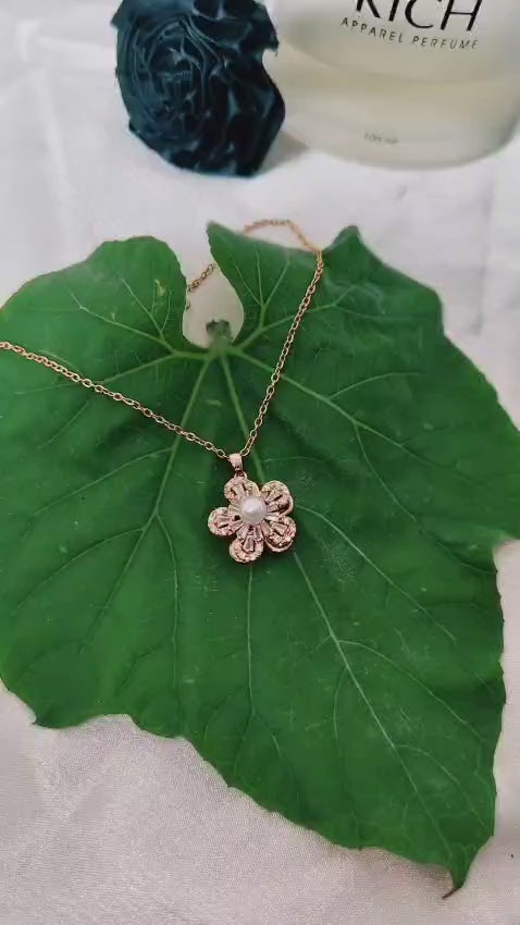 Rotating Flower Pearl Pendant Necklace